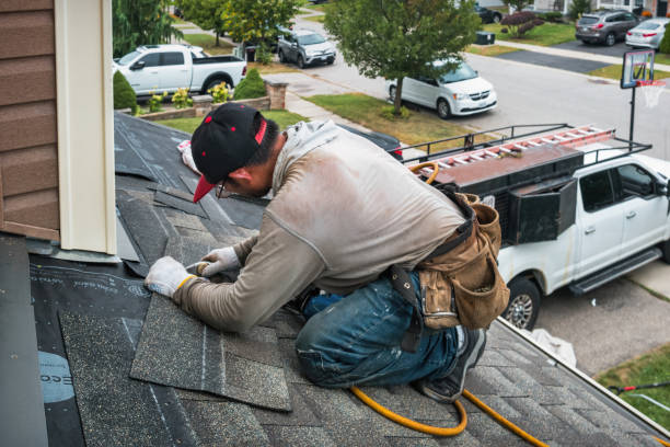 Professional Gutter Installation technician working in Richardson, TX